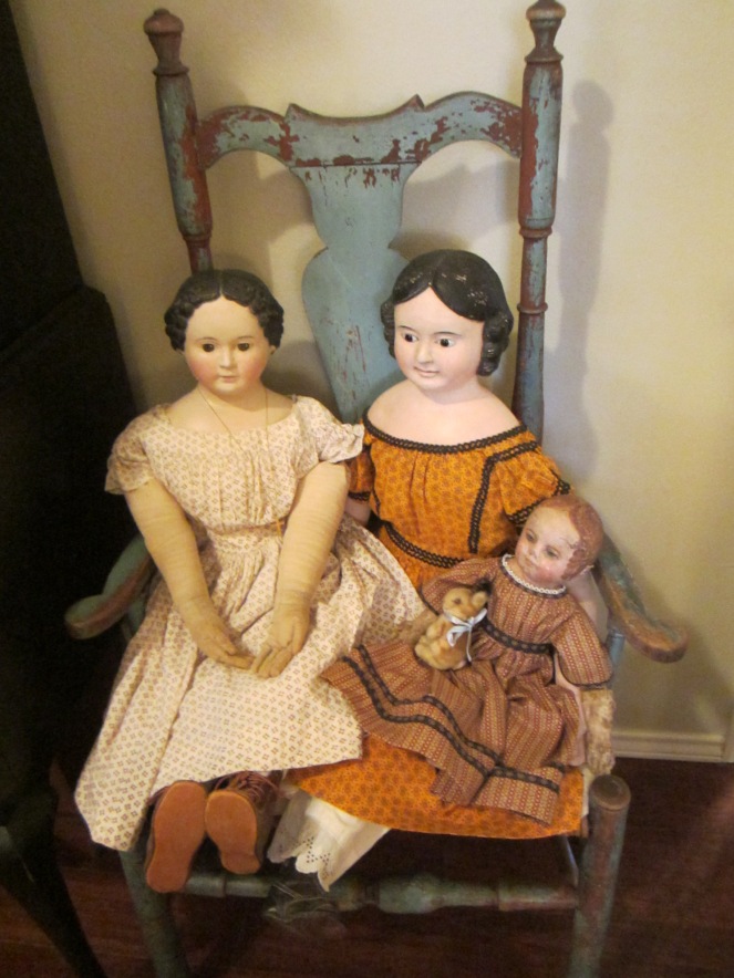 Two papier-mache dolls and a Martha Chase doll that Edyth has repainted.