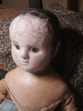 After rebuilding the tip of her nose and most intrusive cracks with a water soluable clay (that could be removed. Restoration work should be able to be undone if possible)